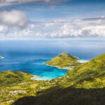Mahe island, Seychelles. Panoramic view on therese island, bay ternay from morne blanc hill view point.