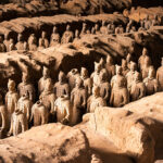 Xi'An,ShaanxiChina-Jan 16 2023 :The Terracotta Army or the "Terra Cotta Warriors and Horses" buried in the pits next to the Qin Shi Huang's tomb in 210-209 BC.